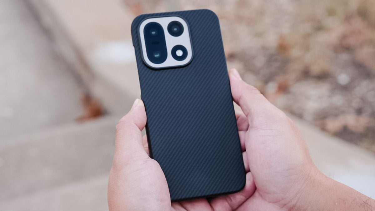 Hand holding OnePlus 15 in Thinborne case
